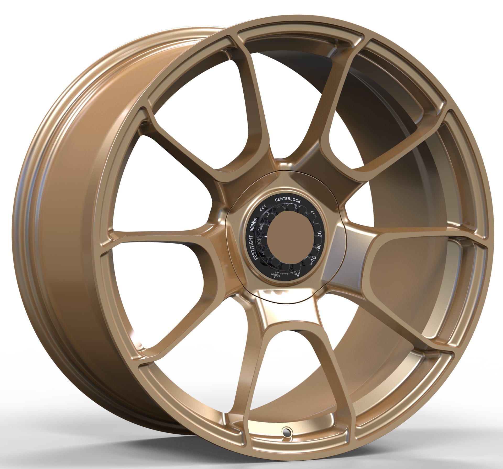 Gold alloy wheel with a prominent logo on a white background